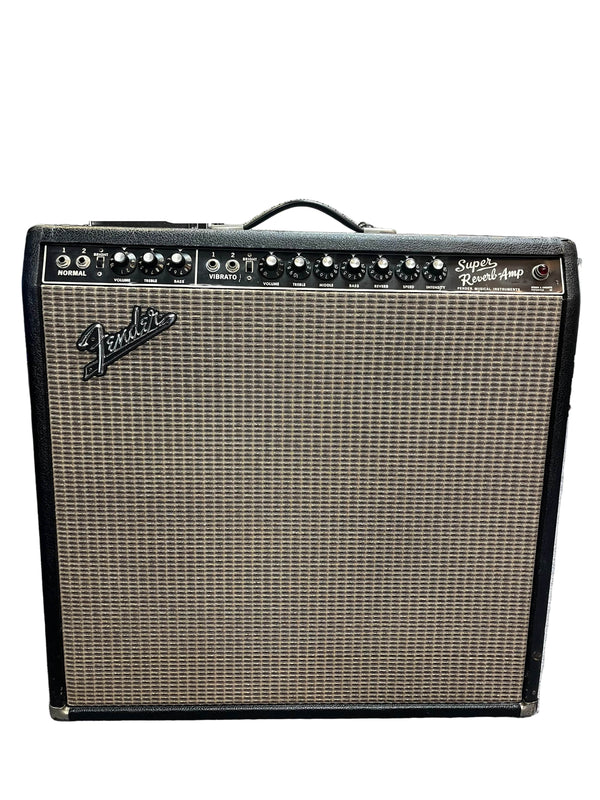 The 1965 Fender Super Reverb - Black Panel from Guitars on Main features control knobs, input jacks, and the classic Fender logo on a woven grille—signature elements of this iconic amp. Available for local pickup.