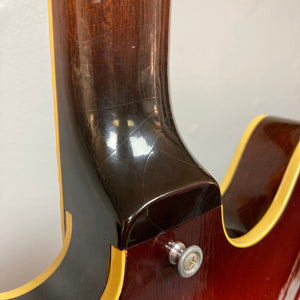 Close-up of the 1967 Gibson ES-335 Sunburst guitar, focusing on the neck and body, showcasing its vintage craftsmanship.