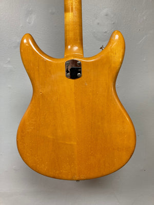 Close-up of the 1968 Kustom K-200A Vintage Guitar w/OHSC, showcasing its wood grain, metal hardware, and strings.