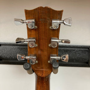 1975 Gibson SG Standard Walnut guitar back view, highlighting its solid Honduran Mahogany body and beveled edges.