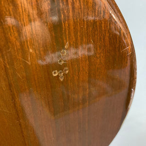 Close-up of 1975 Gibson SG Standard Walnut guitar, showcasing its beveled solid Honduran Mahogany body and Nitrocellulose Lacquer finish.