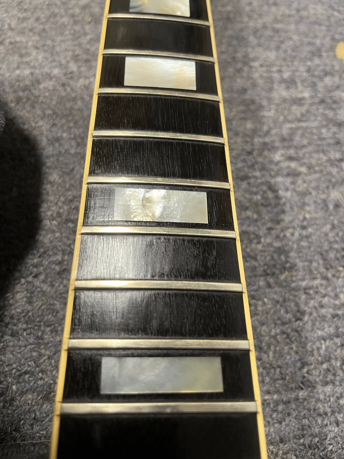 A close-up of the 1980 Gibson Les Paul Custom in a stunning Tobacco Sunburst finish, highlighting its vintage beauty.