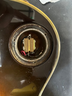 Detailed close-up of the input jack cavity and wiring on a 1980 Gibson Les Paul Custom – Tobacco Sunburst w/OHSC by Gibson, with metal jack removed and striking wood grain—ideal for fans and collectors.