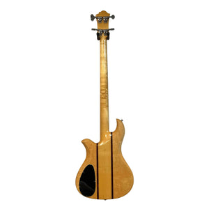 Back view of a 1982 B.C. Rich Eagle Bass—USA made with original electronics—showing neck-through construction, natural wood finish, black panel, and central striped inlay; isolated on white background.