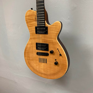 A 2009 Godin Summit CT electric guitar with a carved flame maple cap and dual Seymour Duncan humbuckers hangs against a plain light wall.