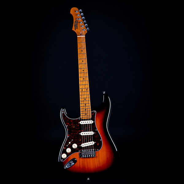 The Jet JS-300 SB LH Left Handed Electric Guitar by Jet features a sunburst finish, a maple neck, an SSS configuration with three single-coil pickups, and a dark pickguard, displayed upright against a black background.