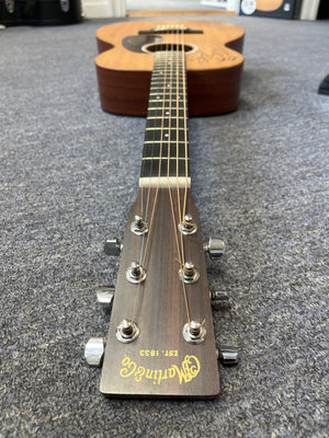 A Martin 00X1AE Acoustic-Electric Guitar signed by Richie Kotzen, viewed from the headstock down the neck.
