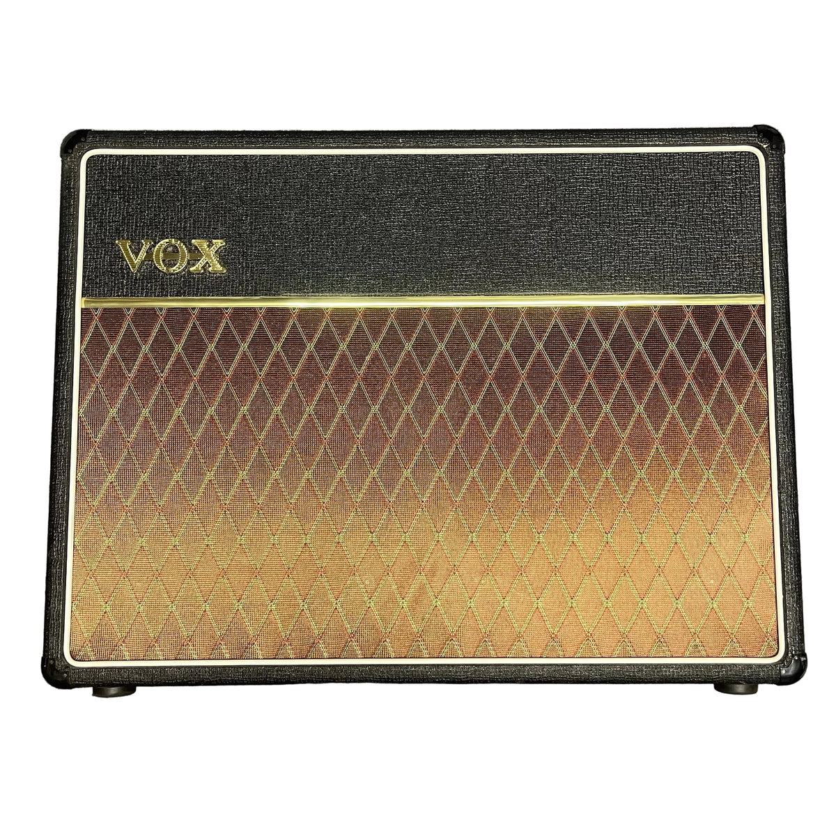 The 2004 Vox AC30/6TB, made in England, features a black control panel, gold VOX logo, brown diamond-pattern grille cloth, and legendary Celestion Alnico Blues speakers.