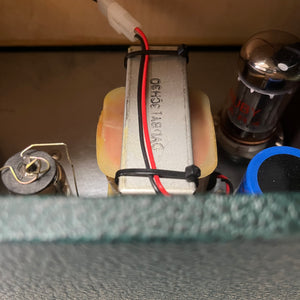 Close-up of electronic components inside a 2005 Divided by 13 RSA 31 Head with Matching 2x12 Cabinet, showing wires, a transformer labeled "C-38430," a vacuum tube, and other hardware from the boutique Divided by 13 amp.