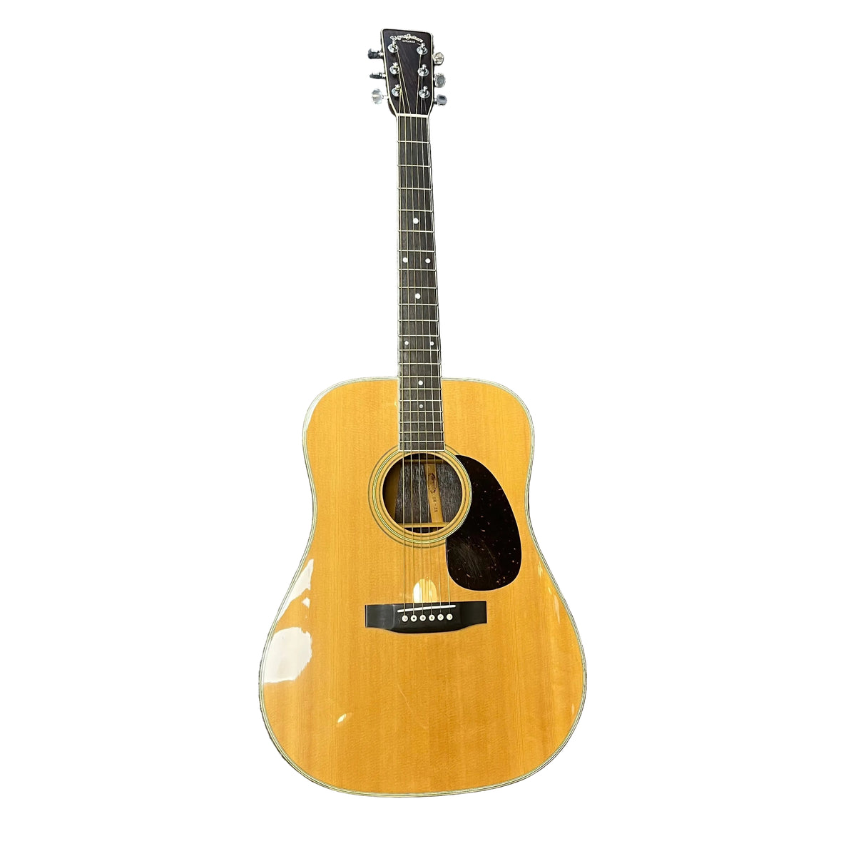 A full view of a Sigma Vintage DR-35 Acoustic Guitar (Made in Japan) with natural wood finish, black pickguard, and six tuning pegs, shown with its case against a white background.