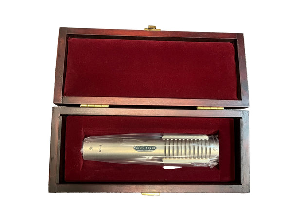 A pre-owned Royer Labs R-121 Ribbon Microphone in excellent condition sits in a red velvet-lined wooden box with an open lid, perfect for your next studio recording session.