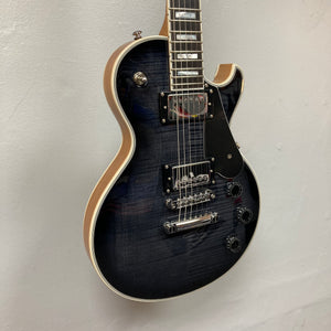 This Schecter Solo-II Custom Trans Black Burst w/Case Used by Schecter features chrome hardware, a black pickguard, white body binding, and USA Pasadena pickups, shown against a plain light-colored wall.
