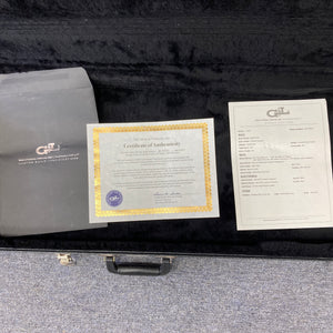 A G&L certificate of authenticity, spec sheet, and black folder are included in the black-lined case with this used G&L L-2000 USA Tobacco Sunburst Bass—the iconic model designed by Leo Fender.