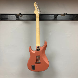An Edwards E-SN7-194MF Mikio Fujioka Signature seven-string guitar in Burgundy Mist, made by Edwards, hangs on a black wall mount and is pictured from the back against a plain light-colored wall.