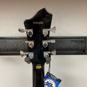 Back of a Hagstrom Fantomen Custom Black w/case guitar headstock showing chrome tuning pegs, serial number G22040764, manufacturer label, and a hanging tag—highlighting the neck-through electric guitar construction and premium Lundgren Design humbuckers from Hagstrom.