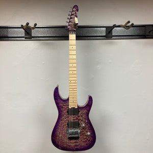 2019 ESP USA M-II Purple Haze Burst electric guitar by ESP, featuring a striking quilted maple top in Purple Haze Burst finish, a maple neck, and dual humbucker pickups, displayed on a wall-mounted rack. This American-made instrument combines premium craftsmanship with bold visual style and comes with a case.