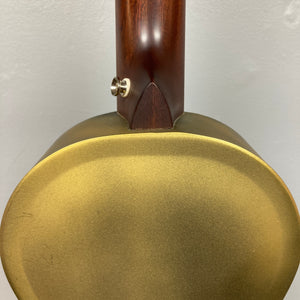 Close-up of the back of a Republic Parlor Resolian Antique Bronze Resonator, highlighting its gold-colored antique bronze resonator and wooden neck, set against a plain light background.