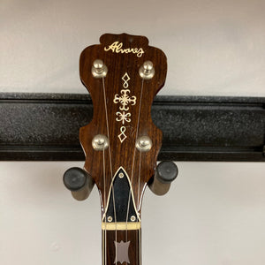 Alvarez Minstrel 4-string Tenor Banjo 1970s on a stand, showcasing intricate inlays and a resonator with detailed wood grain.