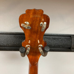 Close-up of an Alvarez Minstrel 4-string Tenor Banjo from the 1970s, highlighting its intricate fretboard inlays and mahogany neck.