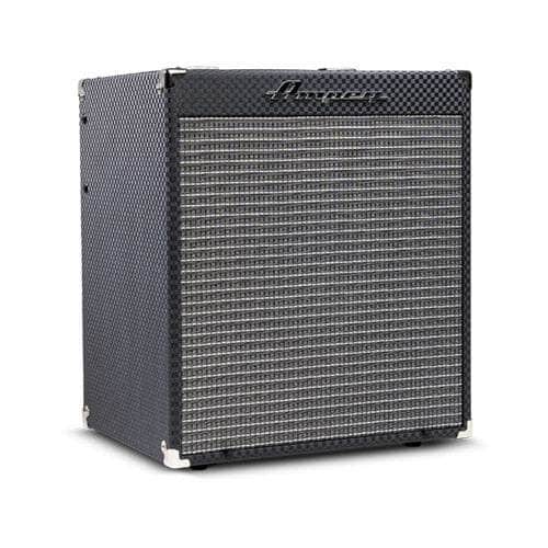 The Ampeg RB110 Rocket Bass Amp features a black textured exterior, silver corner protectors, gray woven grill, Super Grit Technology, and the Ampeg logo on the front panel.
