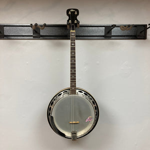 Aria Tenor Banjo 4 String 1970s w/Case displayed on a wall.