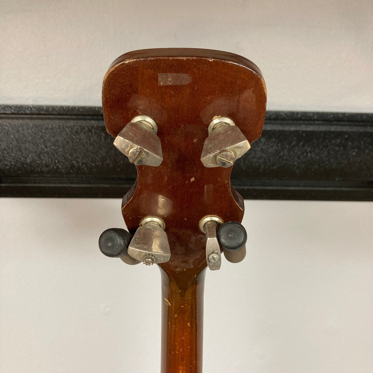 Aria Tenor Banjo 4 String 1970s w/Case, featuring high-quality woods, metal tone ring, and chrome-plated hardware, close-up of tuning knobs and resonator back.