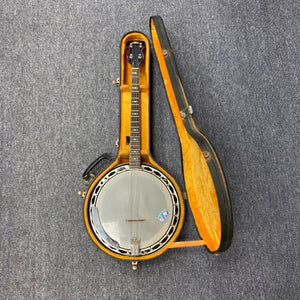 Aria Tenor Banjo 4 String 1970s in a lined case, showcasing its quality craftsmanship and chrome-plated hardware, ideal for jazz and Irish music.