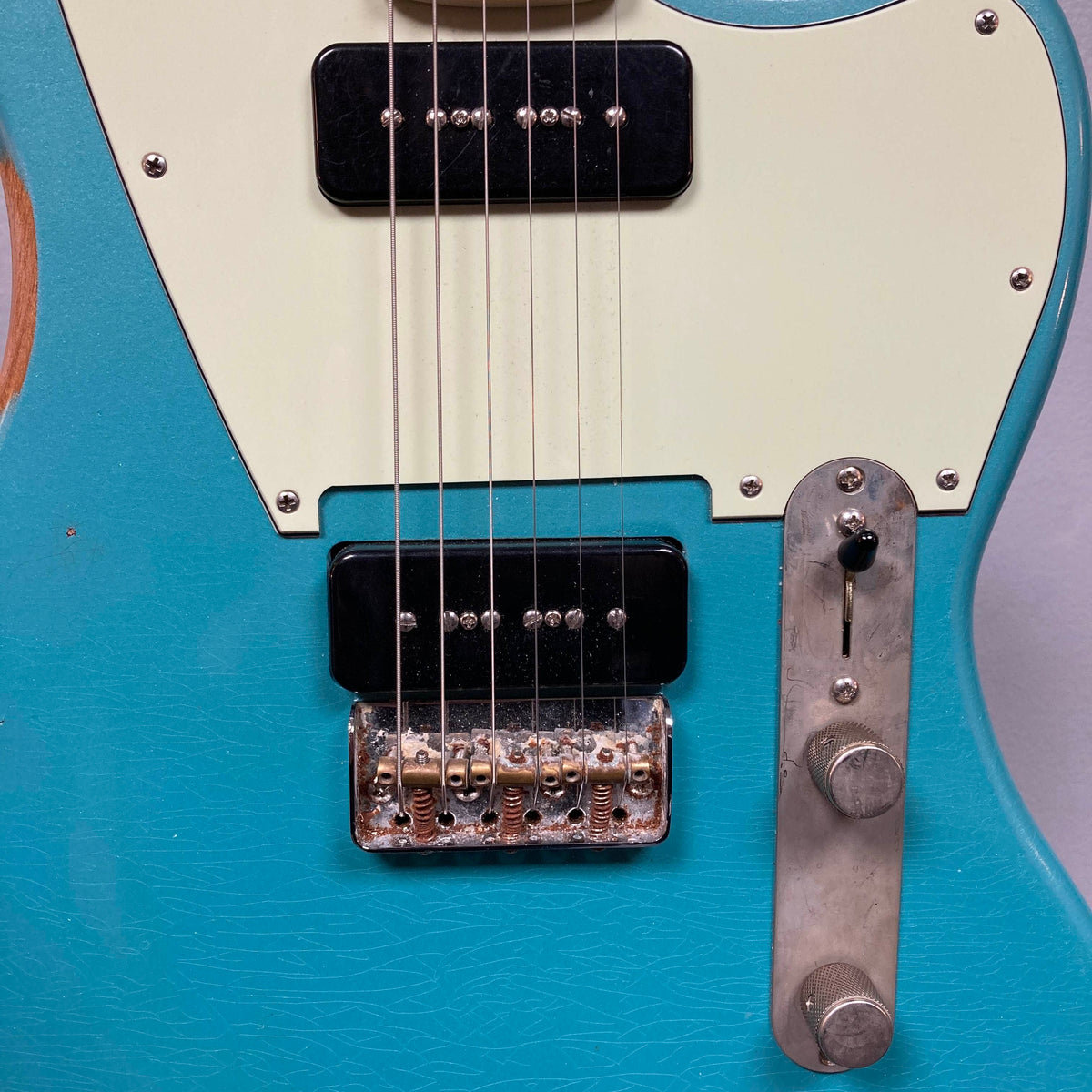 Big River Jazzcaster Custom Relic Pelham Blue Used electric guitar body with two black soapbar Lollar pickups, a white pickguard, and metal bridge and control plate.