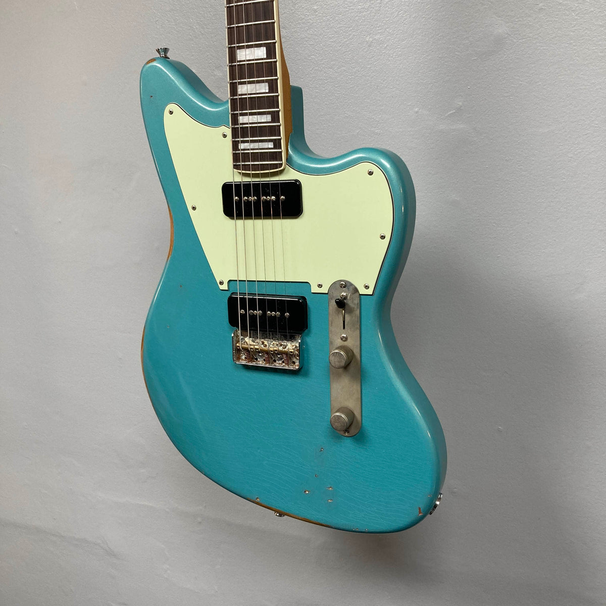 Big River Jazzcaster Custom Relic Pelham Blue Used offset-body electric guitar with a cream pickguard and two black soapbar Lollar pickups.