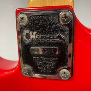 Close-up of the Charvel neck plate fastened with four screws, featuring the Charvel logo and serial number 248698—an iconic detail on the vintage Charvel Model 4 HSS Red w/OHSC Consign electric guitar.