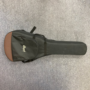 Cort Core-OC Blackwood Acoustic Guitar with solid blackwood body and mahogany neck, showcased on carpet, highlighting premium craftsmanship and sound quality.