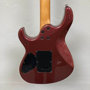 Sure! Here’s a revised sentence using your product data: The image shows the back of the Cort FW-G300 PRO Vivid Burgundy electric guitar by Cort, featuring a maroon finish, a natural wood neck, two black plastic backplates secured with four screws, all set against a white background.