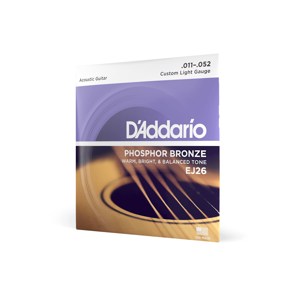 D&#39;Addario EJ26 Phosphor Bronze Acoustic Guitar Strings in a box, custom light gauge .011-.052, offering balanced and warm tone for enhanced guitar sound.