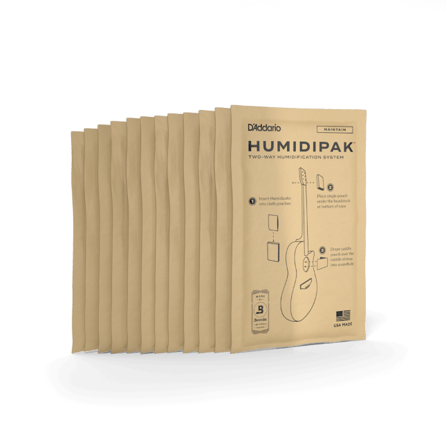 D&#39;Addario Humidipak Maintain Replacement Packet 12-pack, grouped brown packages with instructional papers and guitar diagram, regulates instrument humidity.