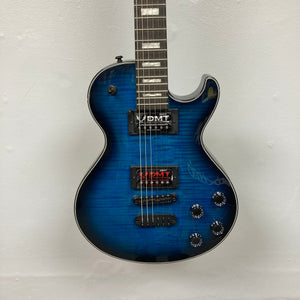 Dean Thoroughbred John Connolly Trans Blueburst electric guitar with black knobs, displayed on a white wall, featuring a flame maple top and ebony fingerboard.