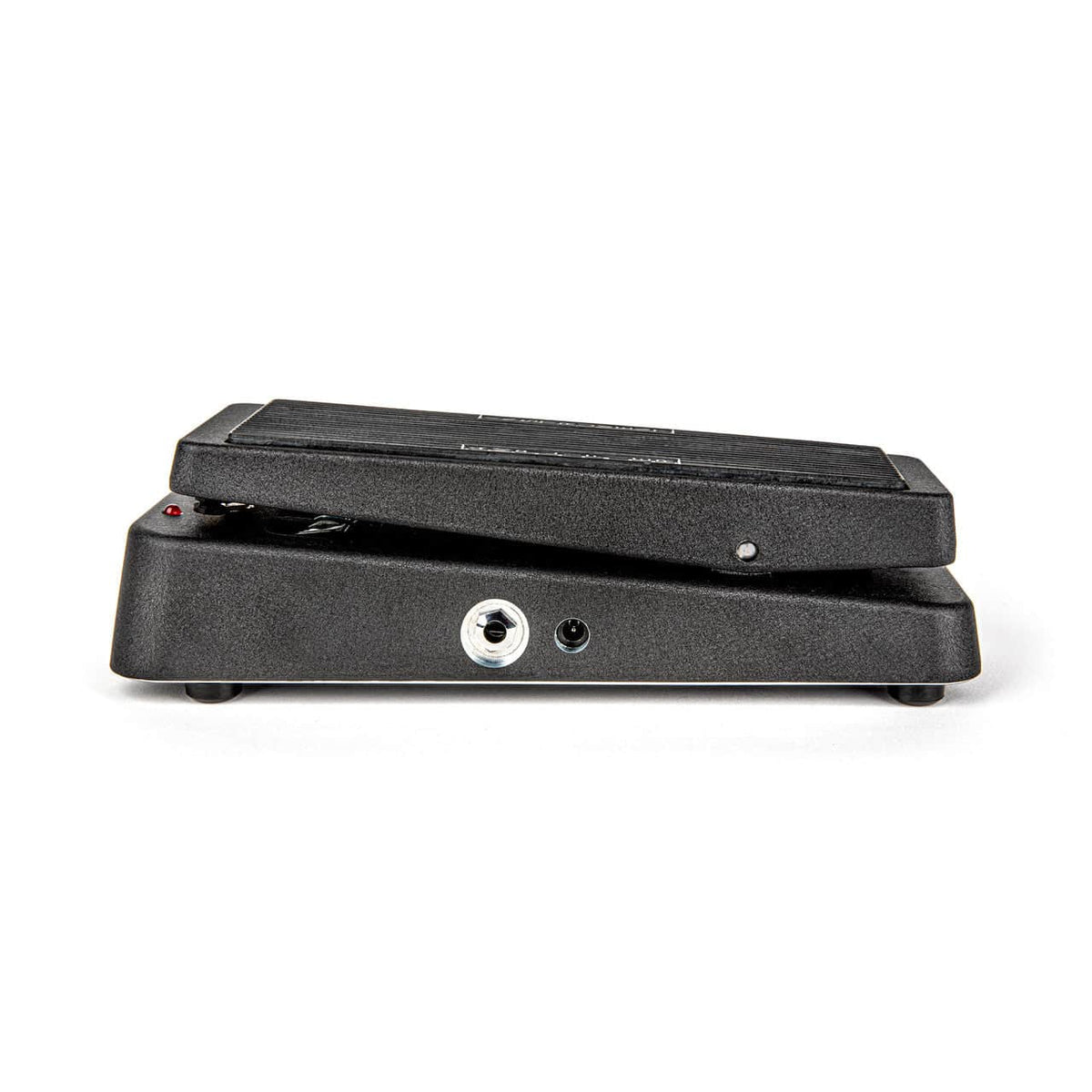 Side view of a black Dunlop Cry Baby BB535 Wah 1994 Reissue | Multi-Function Wah pedal, featuring a slanted foot pedal and visible input/output jacks.