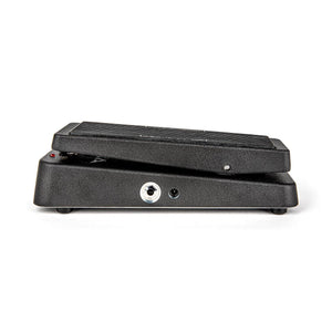 Side view of a black Dunlop Cry Baby BB535 Wah 1994 Reissue | Multi-Function Wah pedal, featuring a slanted foot pedal and visible input/output jacks.