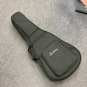 Black Eastman E1D Dreadnought Natural w/Gigbag Used acoustic guitar gig bag with a zippered front pocket and a branded logo.
