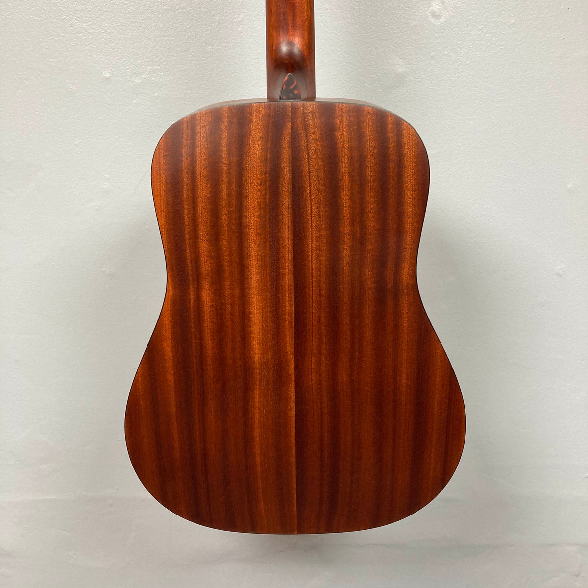 Back view of an Eastman E1D Dreadnought Natural w/Gigbag Used acoustic guitar body and neck.