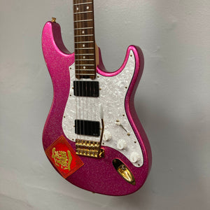 An Edwards ESP E-SN-185-TO Takayoshi Ohmura electric guitar in Twinkle Pink, featuring dual humbucker pickups, a white pickguard, gold hardware, and a red envelope with a gold Chinese character attached to the body.