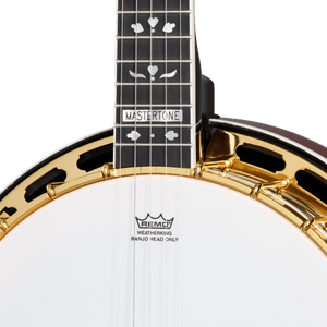 Close-up of the Epiphone Earl Scruggs Golden Deluxe Banjo, showcasing intricate details and gold-plated hardware.