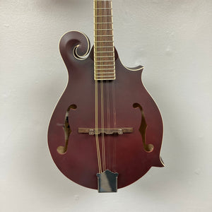 Epiphone F-5 Studio Mandolin in Wine Red Satin, showcasing intricate strings and classic F-style design, ideal for music enthusiasts.