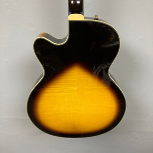 Epiphone Joe Pass Emperor II Vintage Sunburst guitar displayed on a wall, highlighting its elegant design and craftsmanship, offered by Guitars on Main.