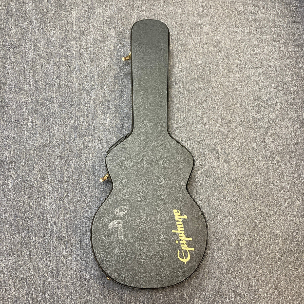 Epiphone Joe Pass Emperor II Vintage Sunburst guitar in its case on display.