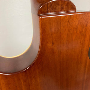 Close-up view of the polished wooden back and neck joint of the Epiphone Les Paul 1957 Goldtop Reissue Blem w/Case, showcasing Epiphone's craftsmanship and iconic design.