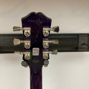 Close-up of the Epiphone SG Modern Figured Purple Burst guitar showcasing its ProBucker™ pickups and sleek body design, with gig bag included.