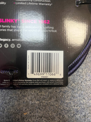 A close-up of an Ernie Ball 25ft Braided Instrument Cable (Straight/Straight, Purple/Black) barcode shows “MADE IN CHINA” and warranty details, highlighting oxygen-free copper for superior sound.