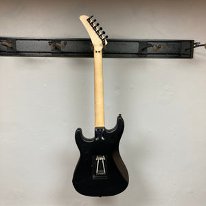 EVH 5150 Standard Stealth Black Used electric guitar displayed on a wall.