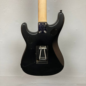 Black EVH 5150 Standard electric guitar with wooden neck, showcasing front and back views, metal springs, and close-up details.