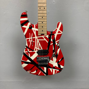 EVH Striped Series electric guitar with distinctive red, black, and white stripes, showcasing close-ups of its body and strings.